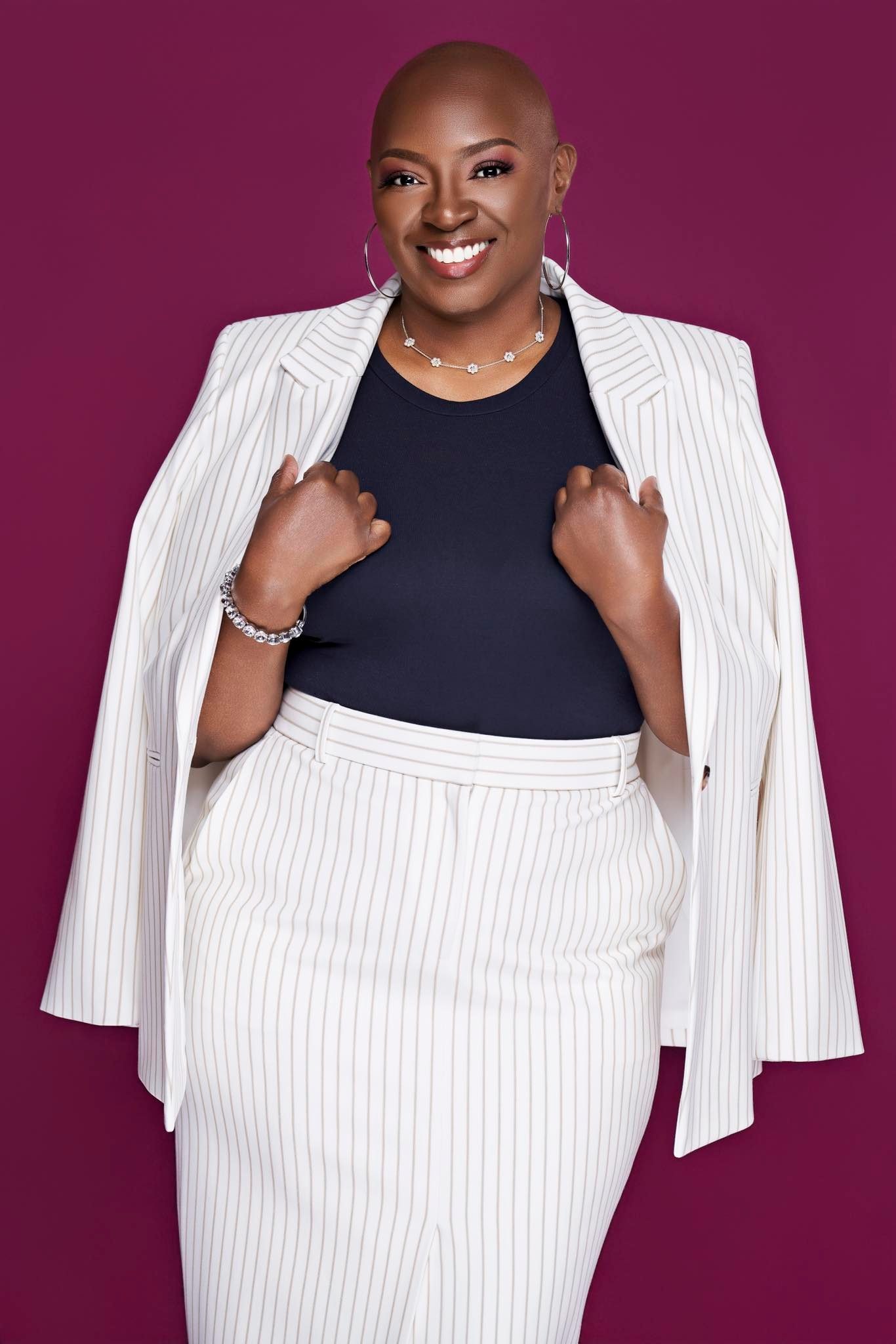 The Tax Fixer — white pinstripe suit, magenta background